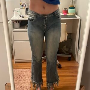 Light wash fringe jeans